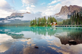 British Columbia Spiritual Events - spiritual view of a lake surrounded by mountains in British Columbia